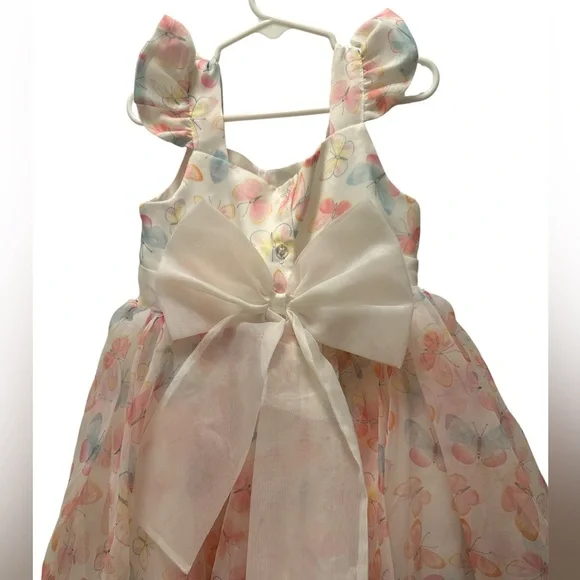 Beautiful ivory dress with a soft pastel butterfly print. - Picture 4 of 5